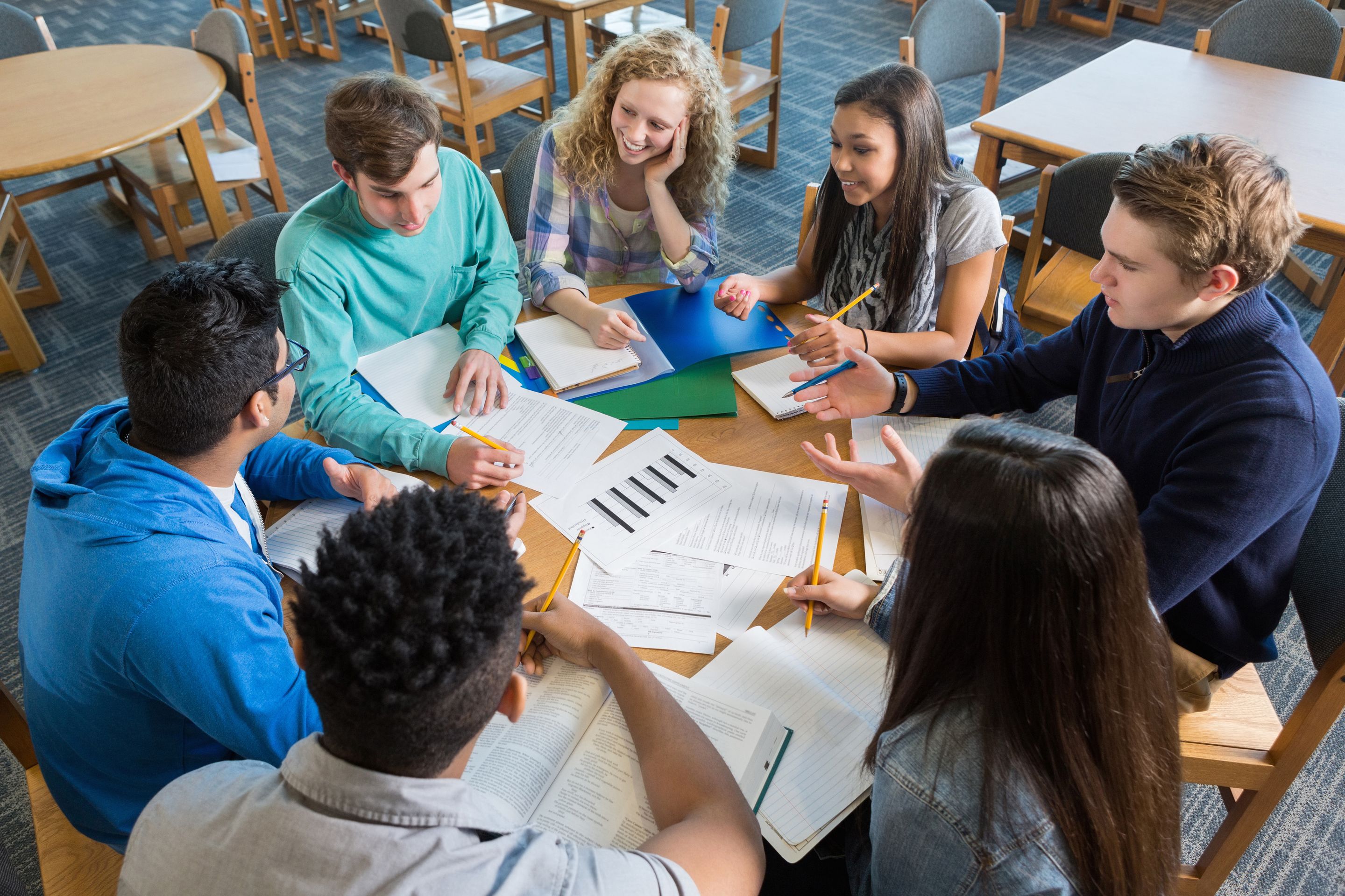 Students collaborating around a table